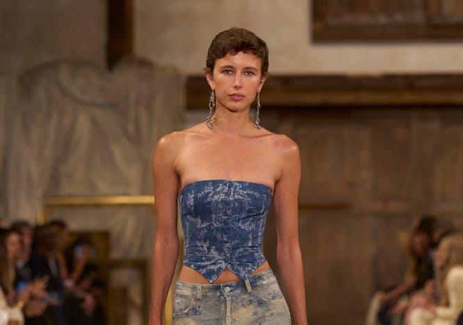 model in denim tupe top and maxi skirt