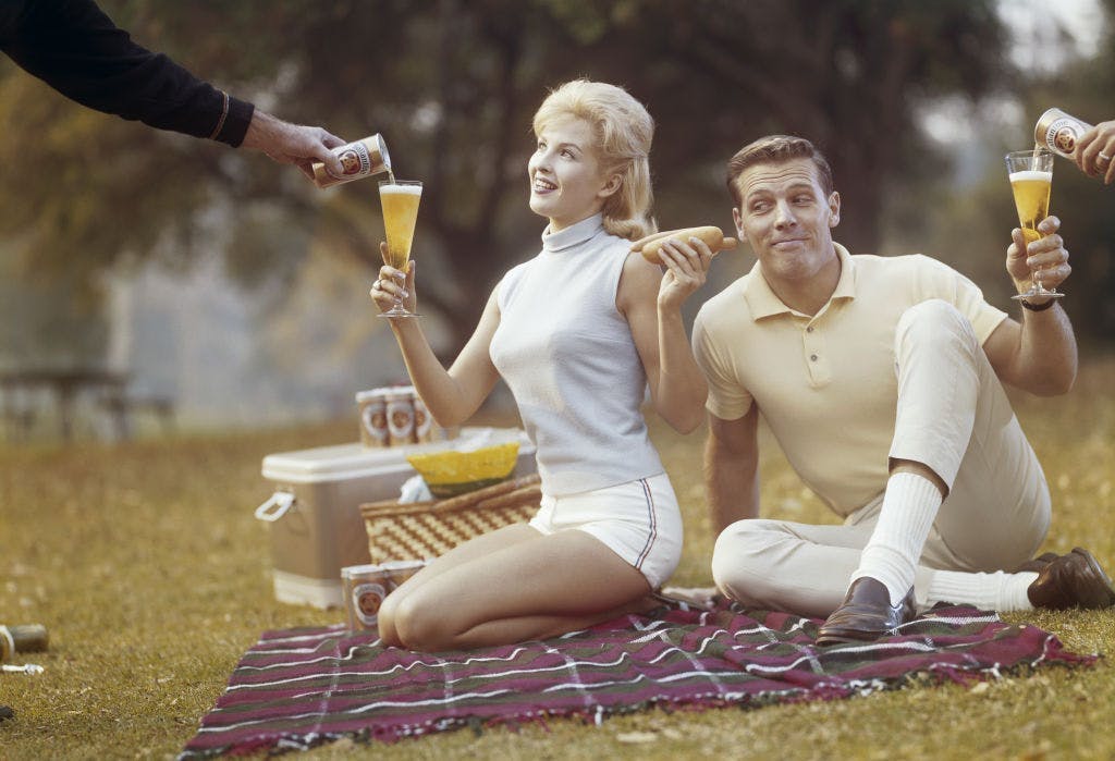 A 1960s couple on a picnic date.