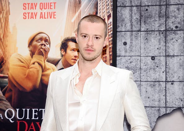 Joseph Quinn in a white suit at the "A Quiet Place: Day One" New York Premiere. Getty Images.