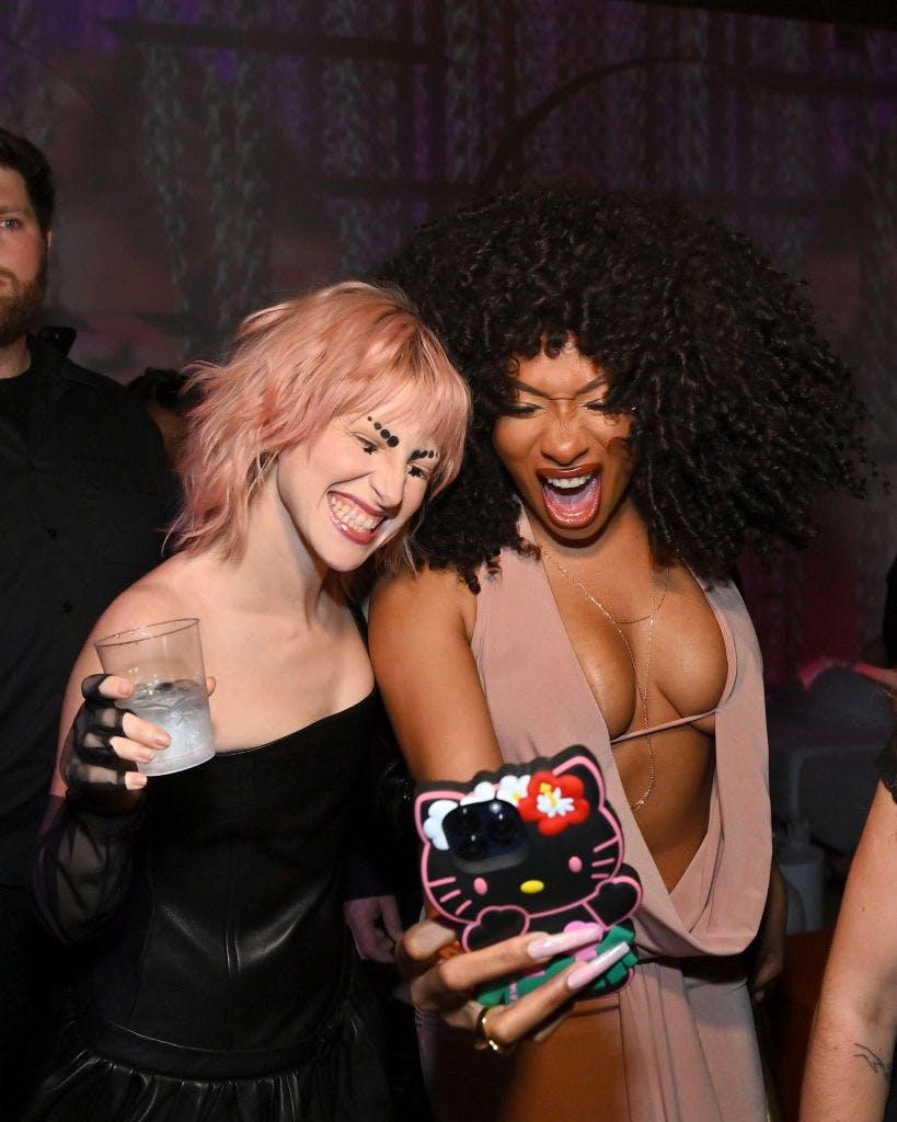 Hayley Williams and Megan Thee Stallion attend NYLON Nights: NYFW x Paris Hilton Infinite Icon Album Release Party. Getty Images.