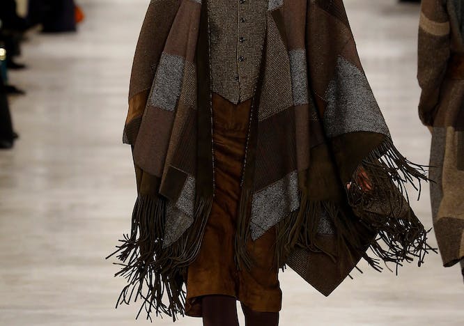 coat clothing apparel fashion person human cloak