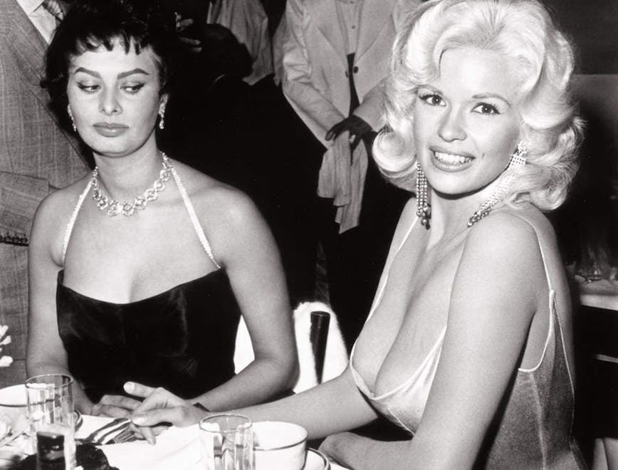 Jayne Mansfield photographed with Sophia Loren in the 1957 party