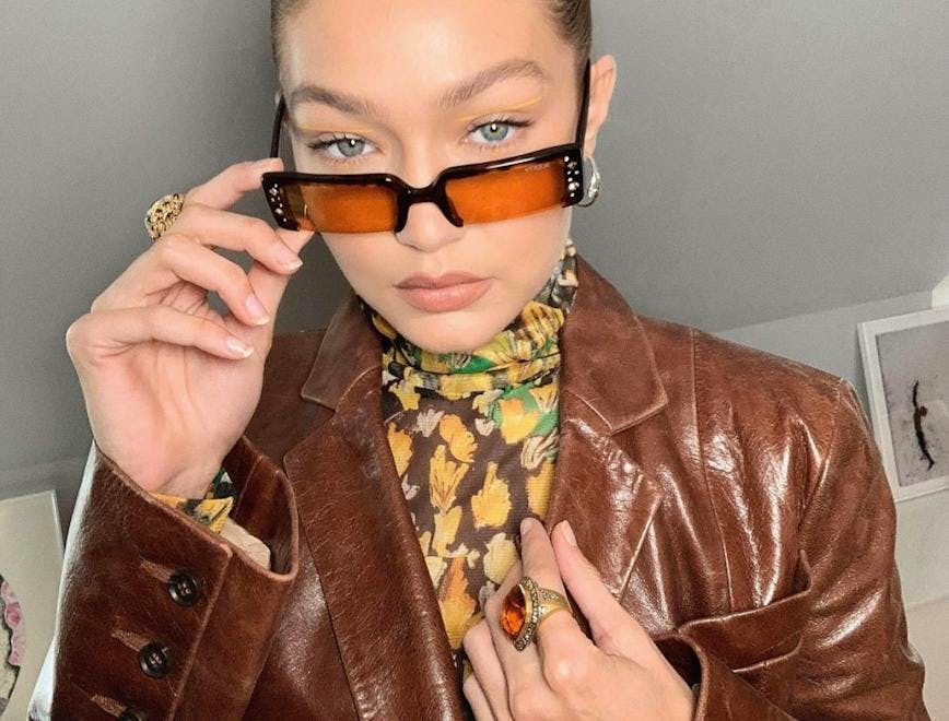 clothing apparel jacket coat person human sunglasses accessories accessory glasses