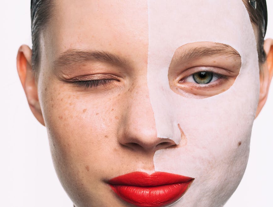 model wearing a face mask on one side of their face
