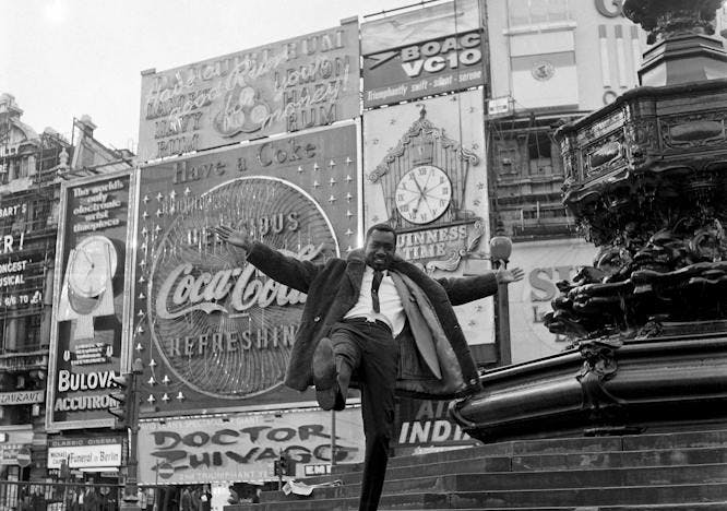 Radio host and BBC Africa service presenter Mike Eghan in Piccadilly Circus, London, 1967. Courtesy of Galerie Clémentine de la Féronnière.