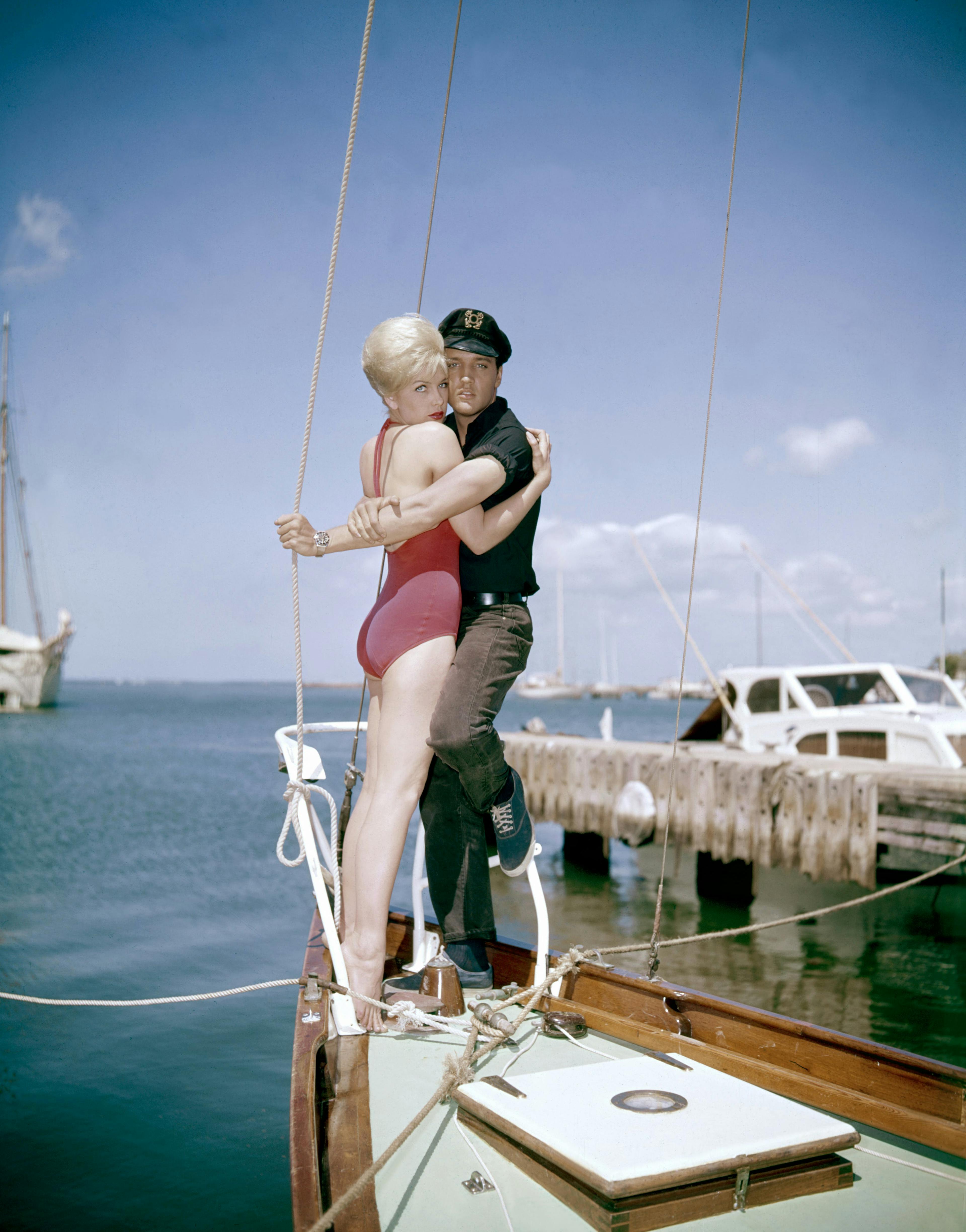 Elvis Presley and Stella Stevens on a boat.