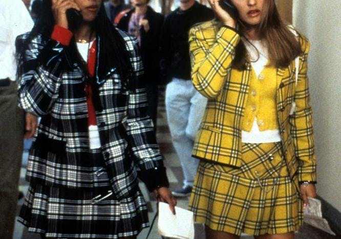 Stacey Dash & Alicia Silverstone in Clueless wearing iconic black white and yellow plaid sets