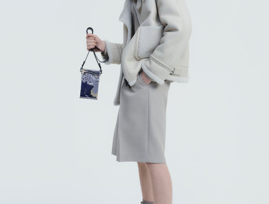 clothing apparel sleeve person overcoat coat accessories female handbag bag