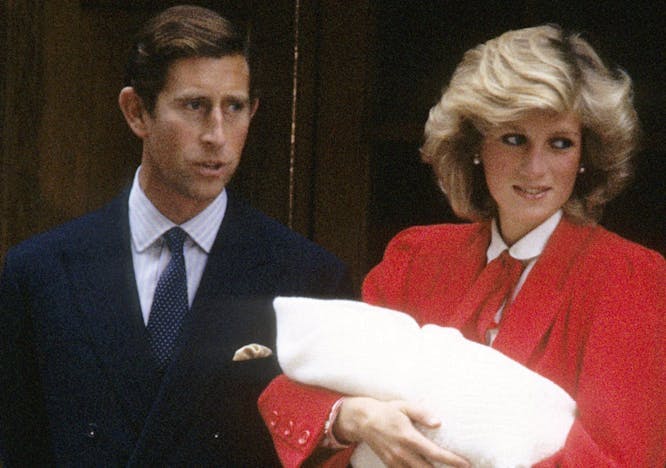 Princess Diana and Prince Charles with their newborn son, Prince Harry
