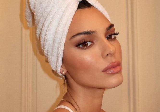 Kendall Jenner with a towel around her head