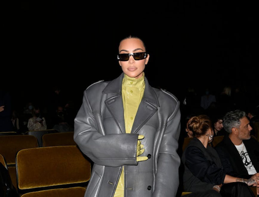 milan clothing apparel person sunglasses accessories overcoat coat shoe footwear suit
