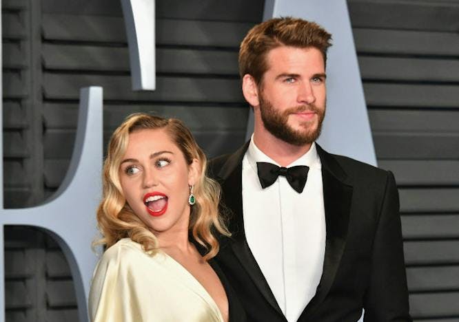 Miley Cyrus and Liam Hemsworth on the red carpet