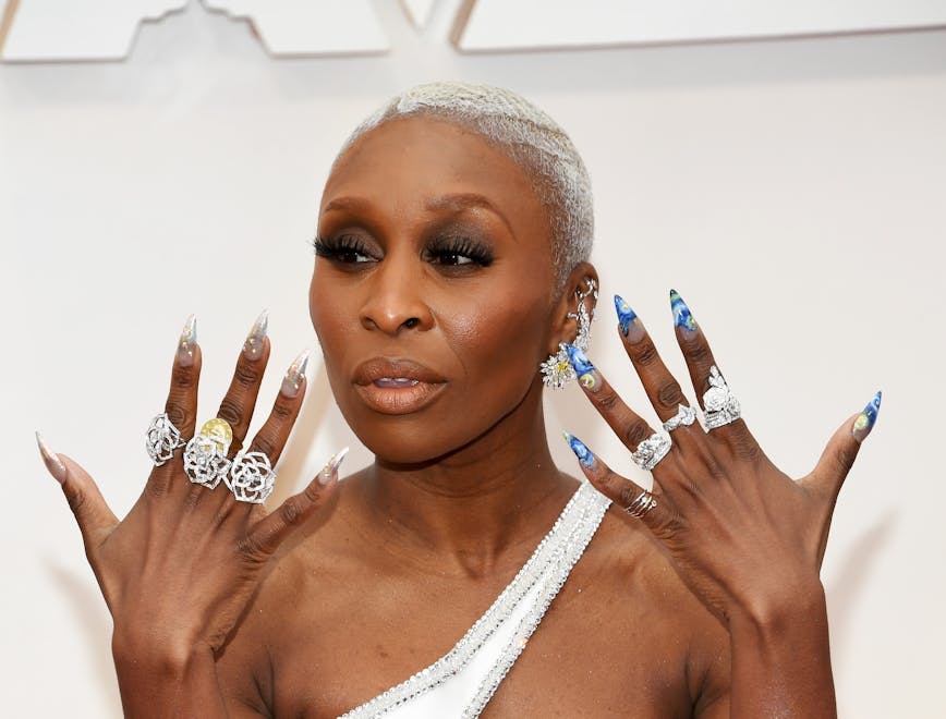 Cynthis Erivo shows gorgeous nails on red carpet.