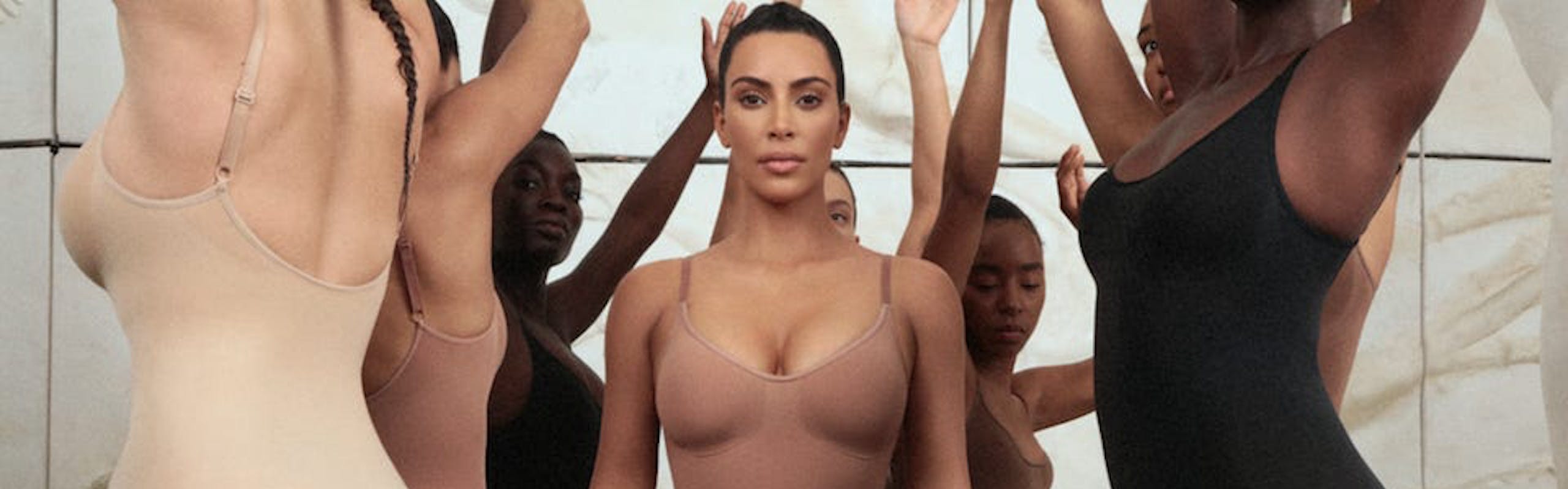 Kim Kardashian wearing brown SKIMS shapewear