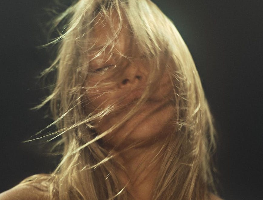 Kate Moss with wind-blown hair.
