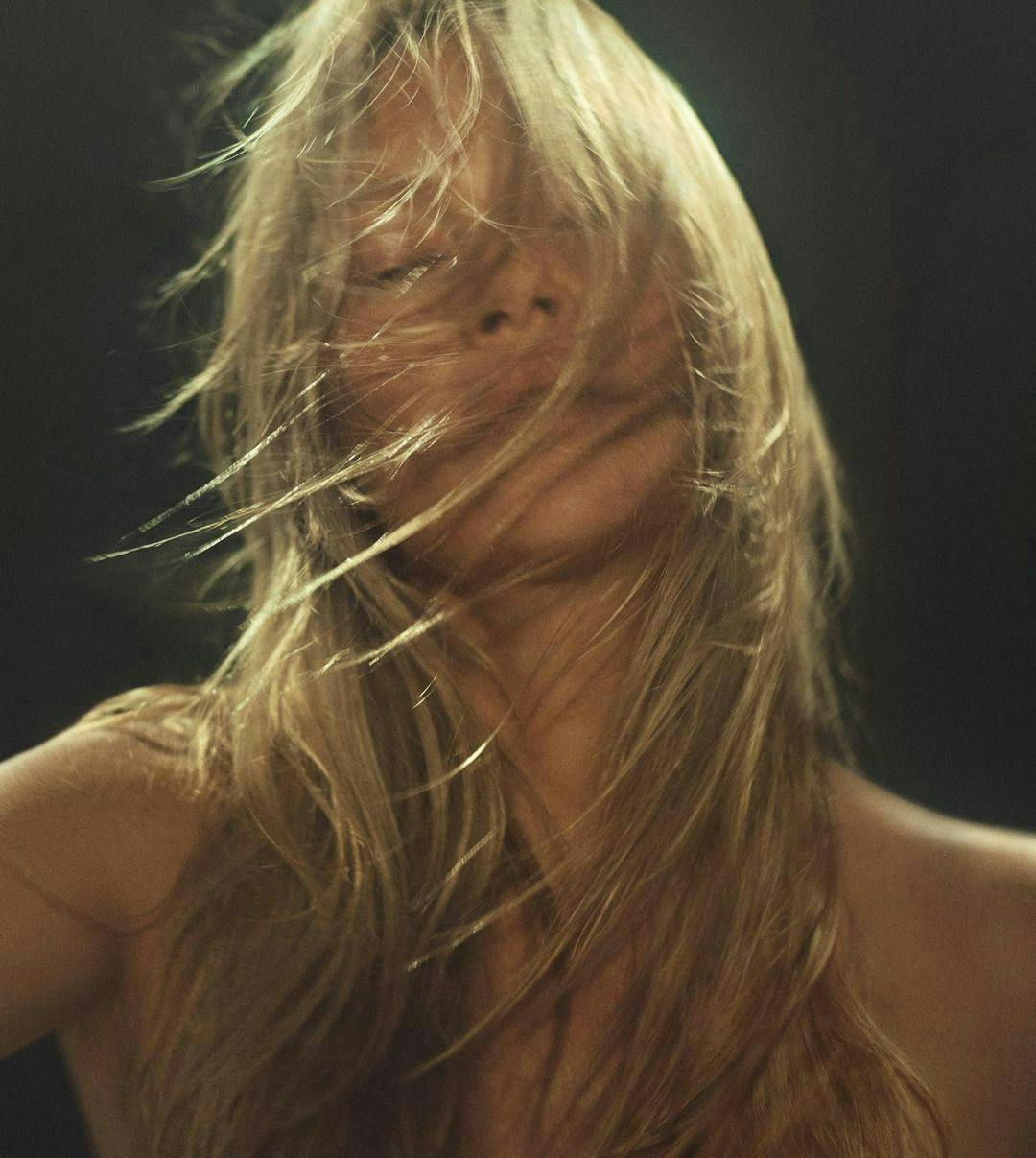 Kate Moss with wind-blown hair.