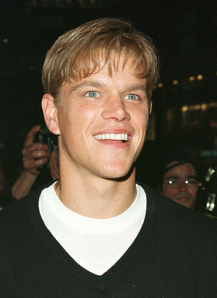 A young Matt Damon smiling to the camera.