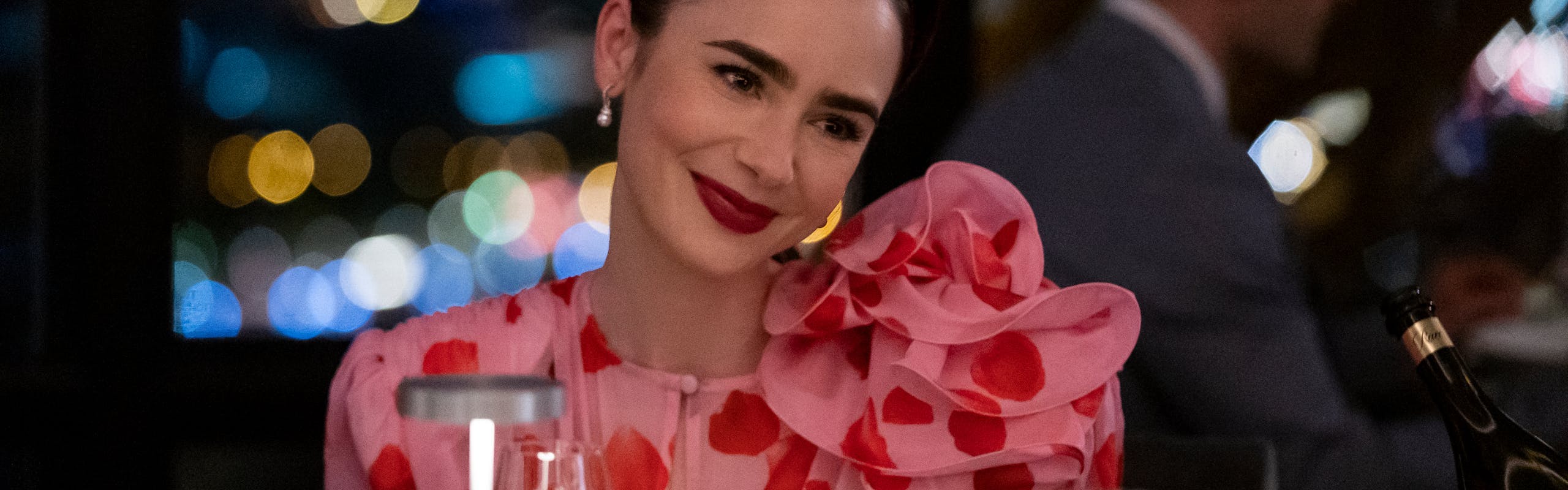 woman in pink polka dot dress at restaurant