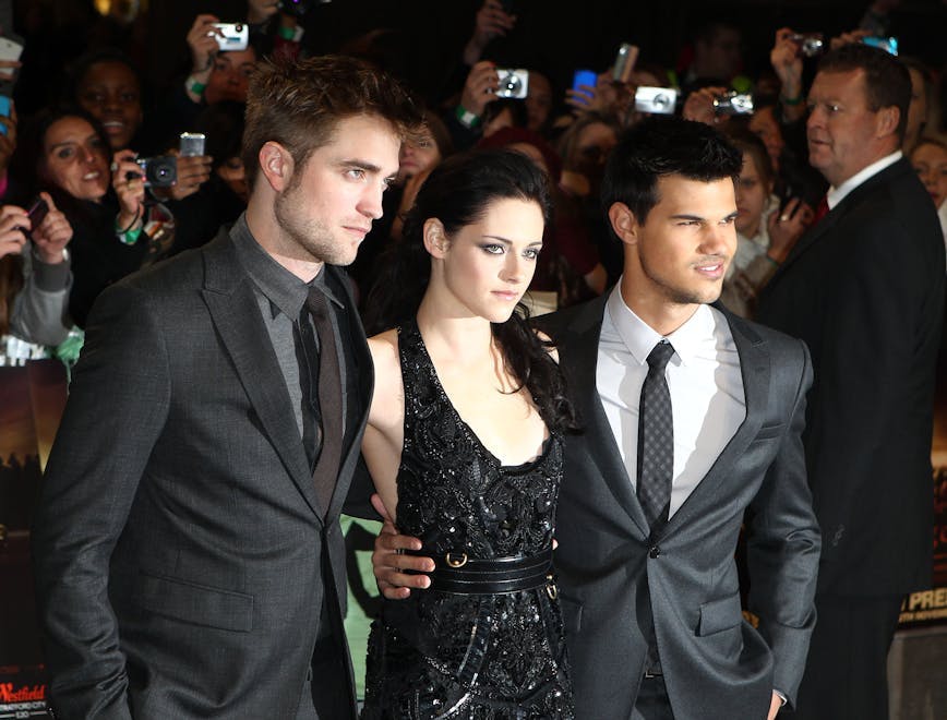 Robert Pattinson, Kirsten Stewart, and Taylor Lautner at the Twilight movie premiere.