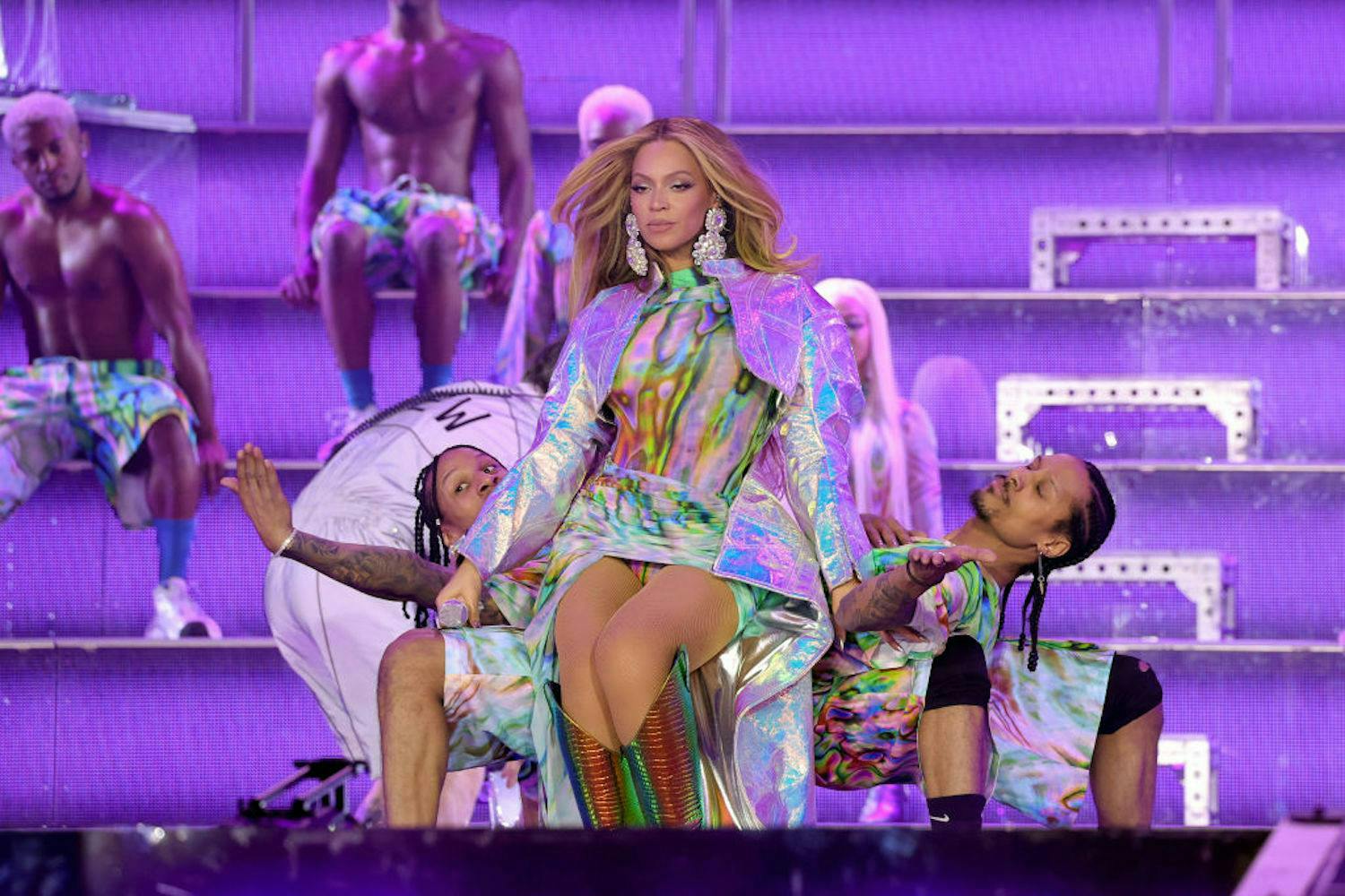 Beyoncé in a silver mini dress.