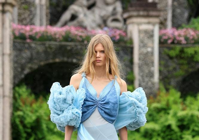 A model in a blue gown for Louis Vuitton.
