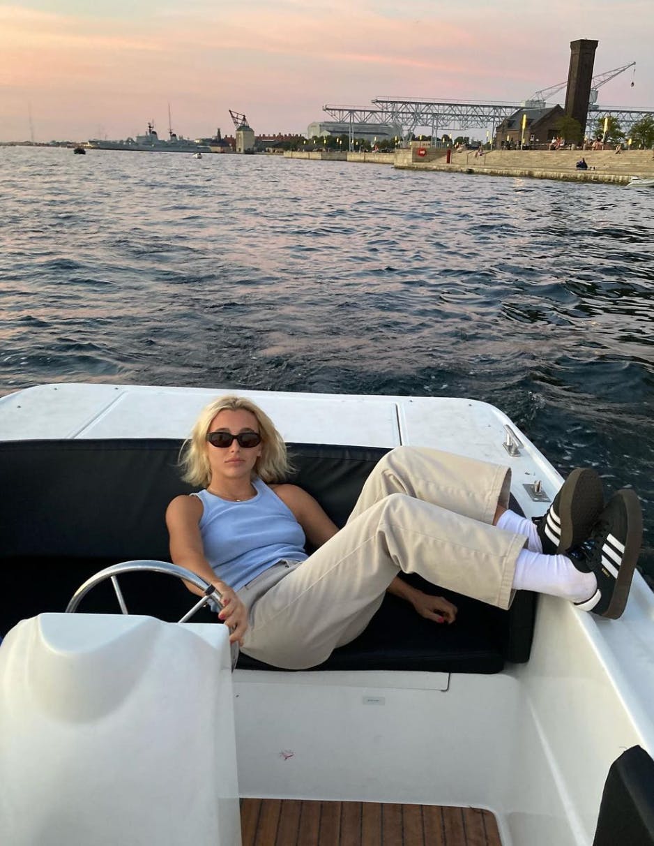 Emma Chamberlain on a boat