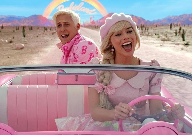 Barbie and Ken driving in a car through Barbie Land