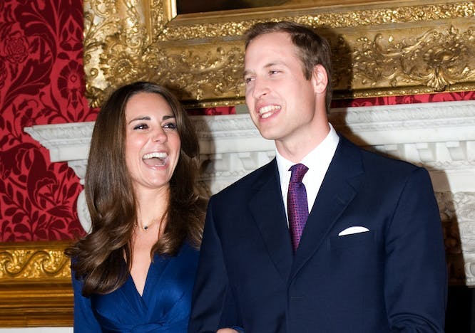 british royal titles Kate Middleton and Prince William laughing arm and arm at an event.