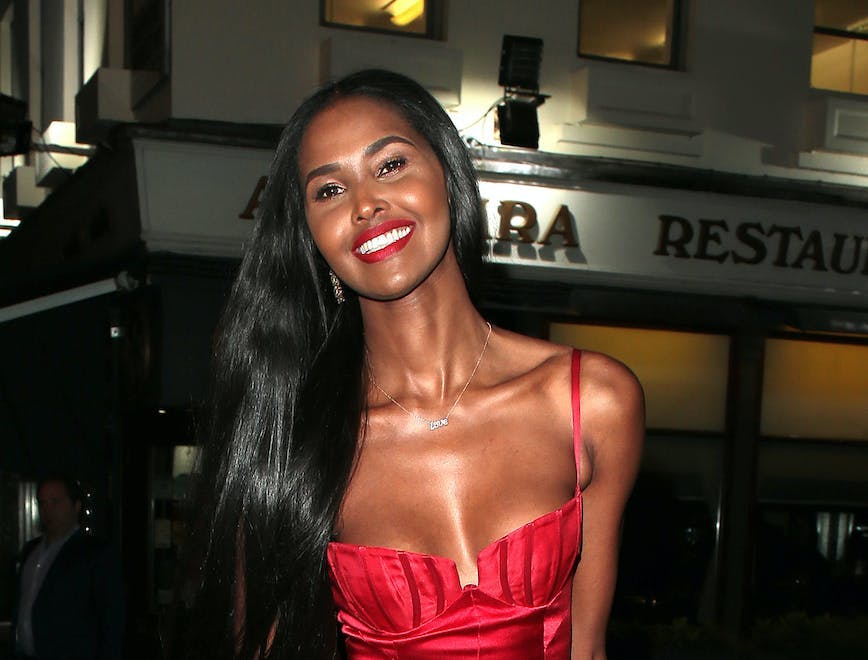 Young Ubah Hassan model photos; Ubah Hassan arriving at a club in London in a red dress in 2017.