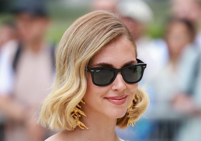 woman with sunglasses and italian bob haircut