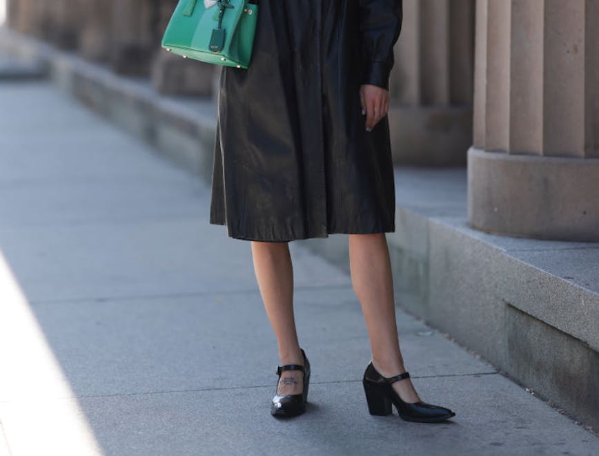 woman in black coat and mary jane shoes for fall