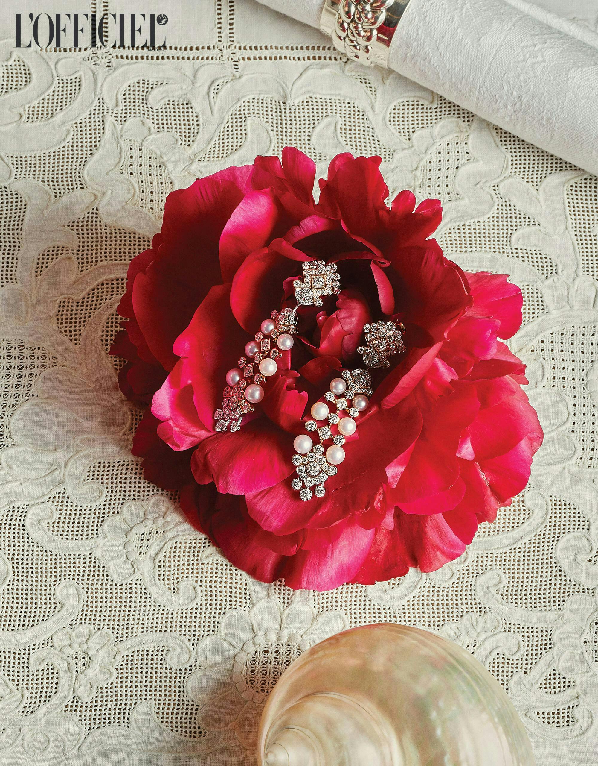 pearl and diamond earrings on rose
