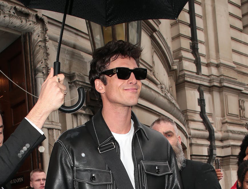 coat jacket accessories sunglasses adult male man person finger face