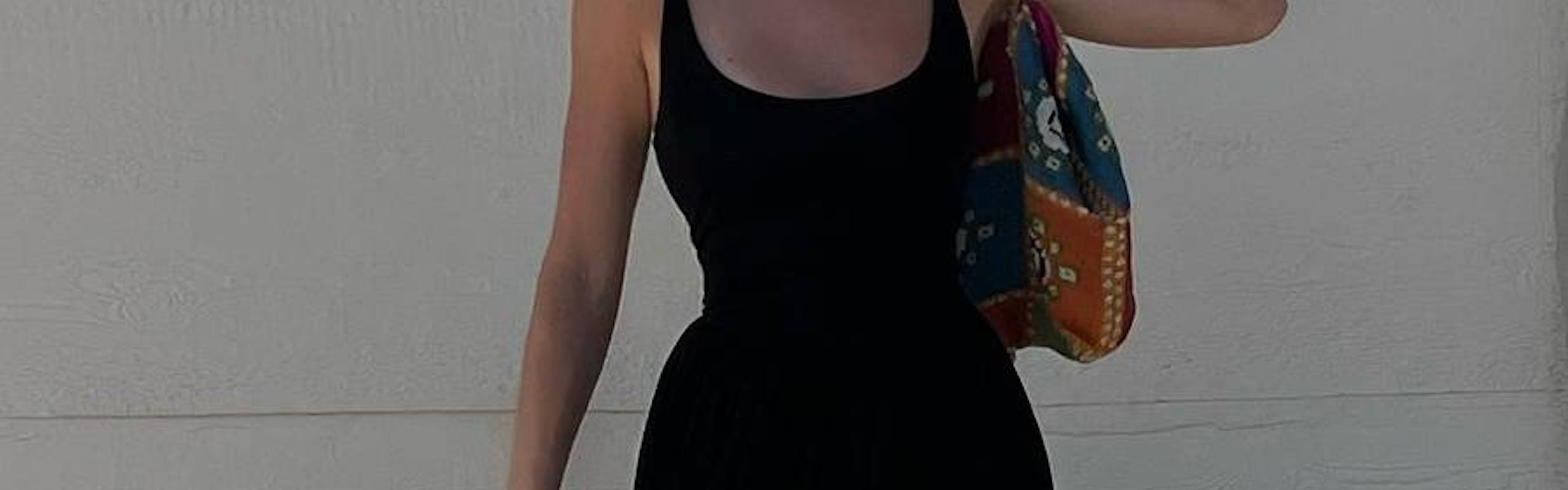 kendall jenner wearing black drop waist dress and sunglasses