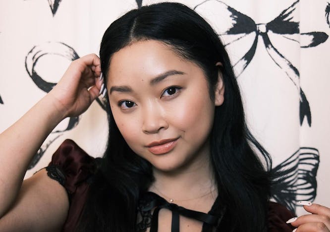 lana condor in a black lace dress with demi method makeup