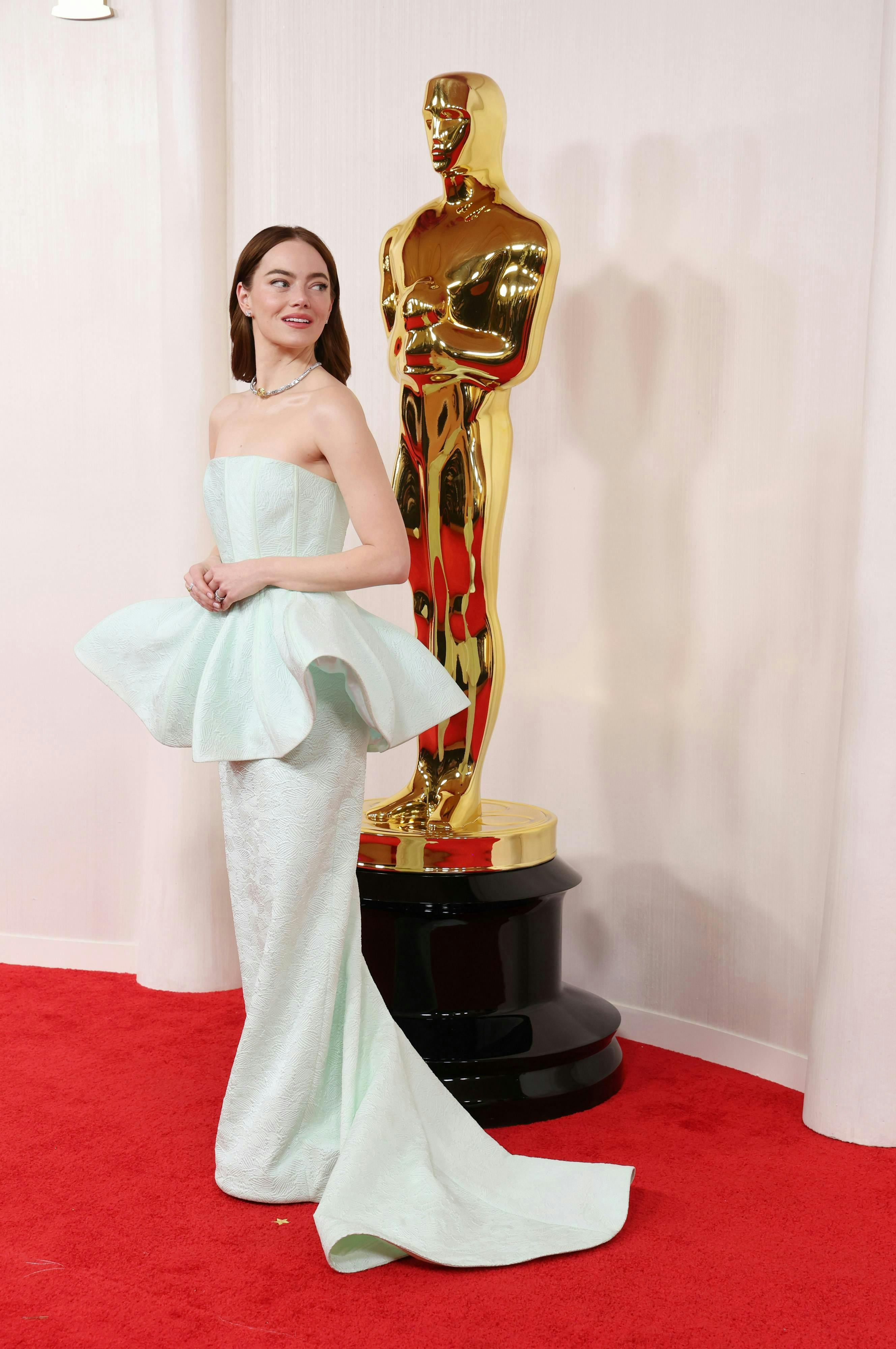 Emma Stone in custom Louis Vuitton. Courtesy of Getty Images.
