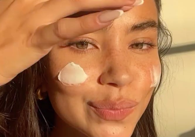 most expensive skincare products: christina nadin applying a moisturizer