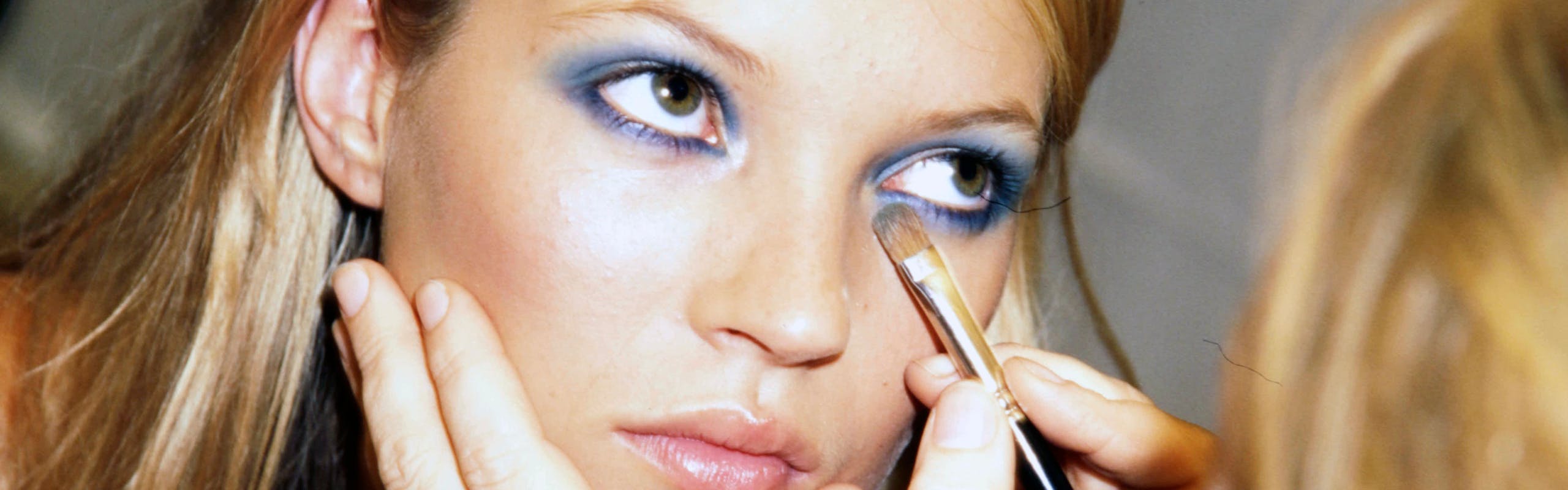 blue eyeshadow color trend: Kate Moss, Backstage at Gucci's Spring/Summer 1996 Ready-to-Wear show.