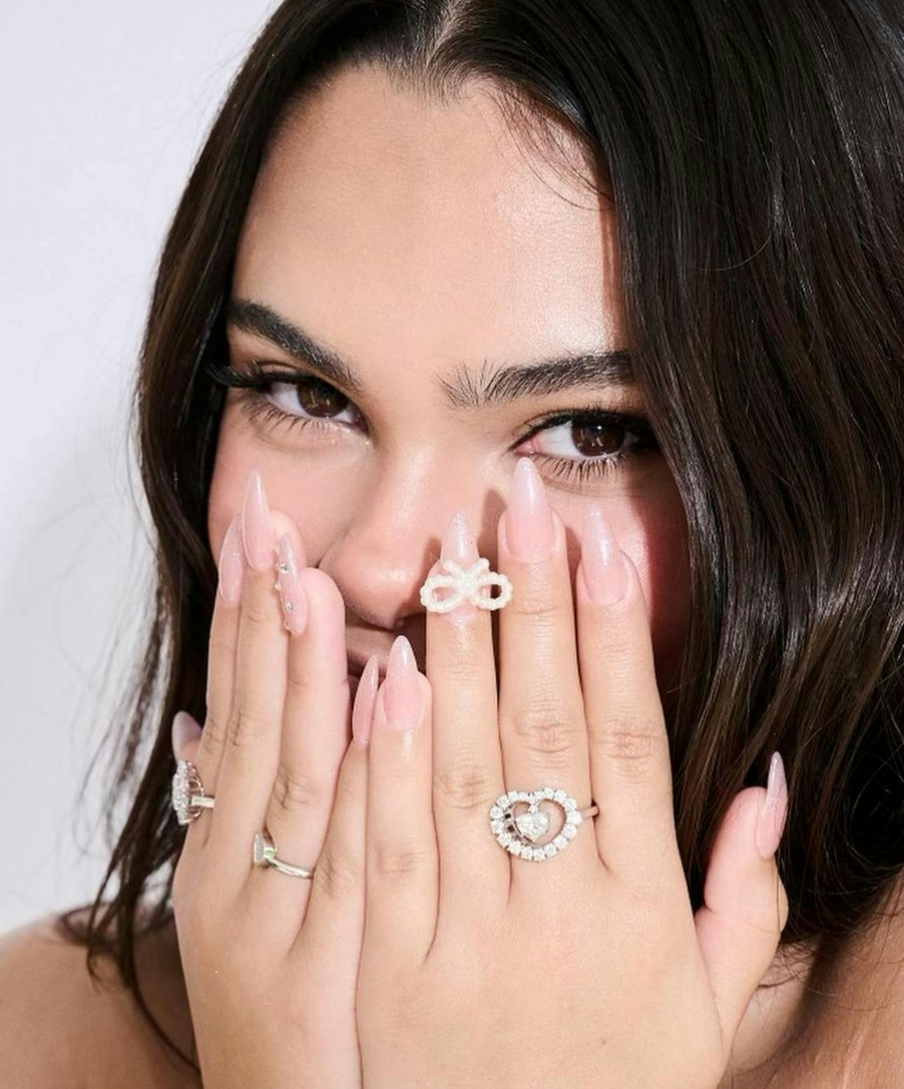 spring nail art trend manicure: Ariana Greenblatt's Pearl-Embellished Nails.