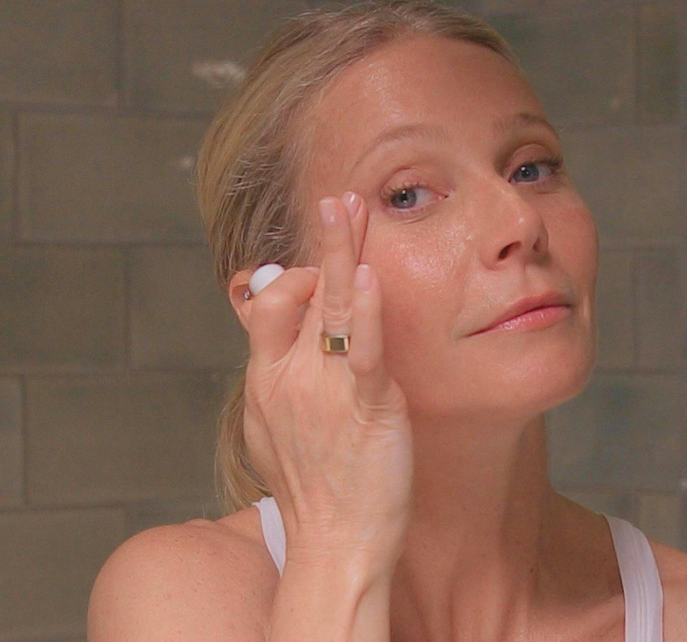 retinol eye creams: gwyneth paltrow applying skincare