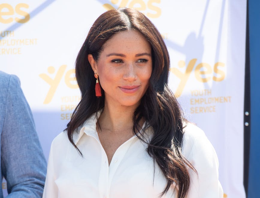 Meghan Markle visited the Tembisa Township to learn about Youth Employment Services during their royal tour of South Africa. Photo courtesy of Getty Images.